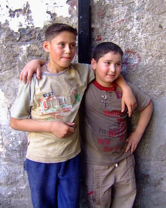 Two boys in Aleppo--friends or brothers--enjoying a peaceful moment together